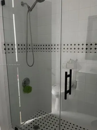 a chair and table sitting in backyard of a house