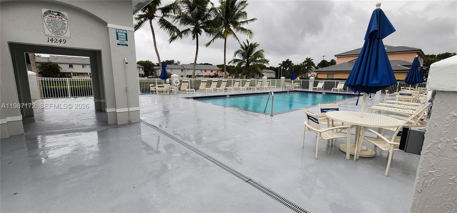 14133 Southwest 121st Place, Unit 9 Miami, FL 33186 - Photo 17 of 20 a view of outdoor kitchen with outdoor seating