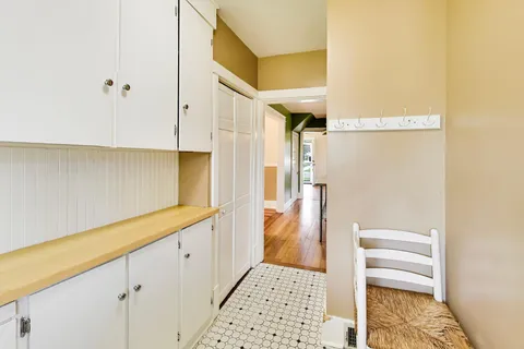 a bathroom with a shower and a sink