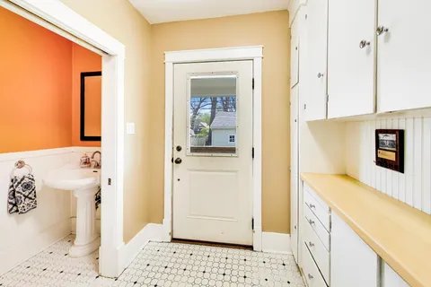 a bathroom with a sink and a mirror