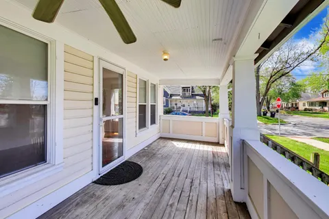 a view of a living room and entry way