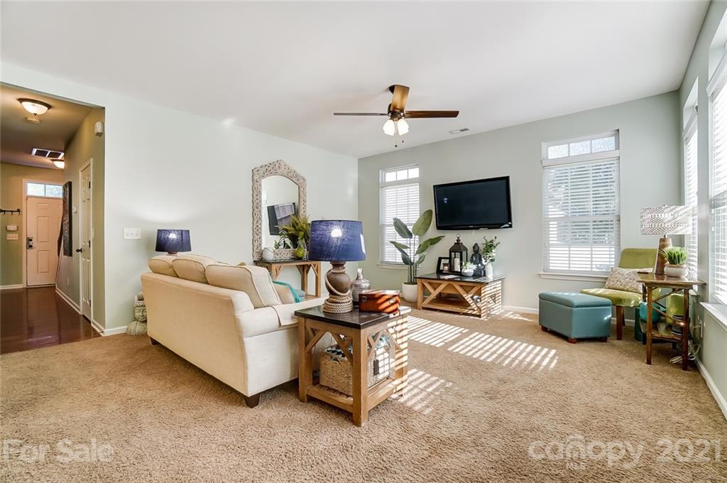 725 Prospect Lane Fort Mill, SC 29708 - Photo 12 of 26 a living room with furniture and a flat screen tv