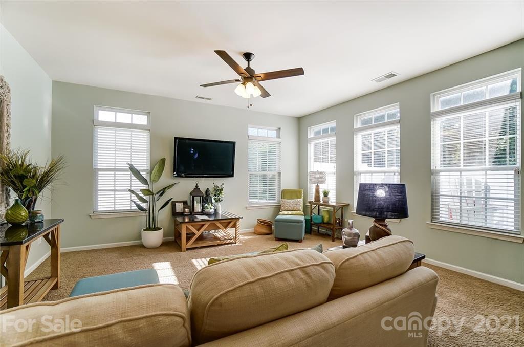 725 Prospect Lane Fort Mill, SC 29708 - Photo 13 of 26 a living room with furniture and a flat screen tv