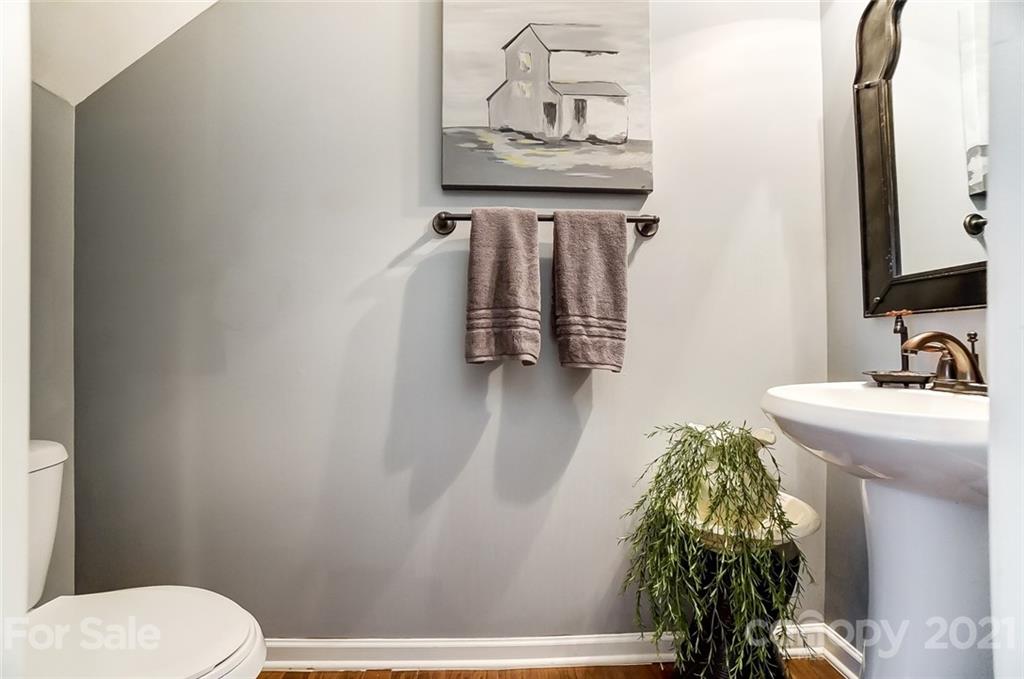 725 Prospect Lane Fort Mill, SC 29708 - Photo 14 of 26 a bathroom with a toilet and a sink