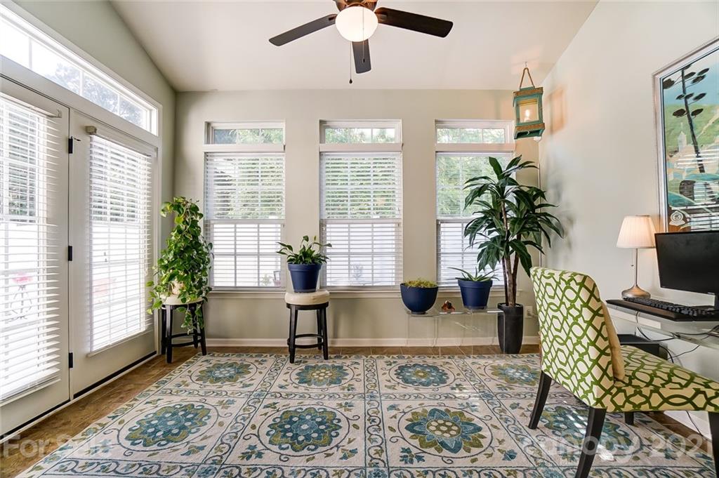 725 Prospect Lane Fort Mill, SC 29708 - Photo 9 of 26 a view of a livingroom with furniture and a potted plant