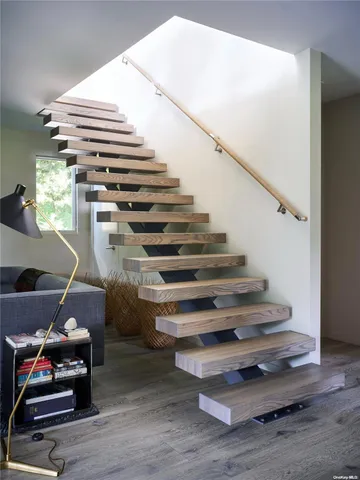 a table with wine bottles and glasses on it