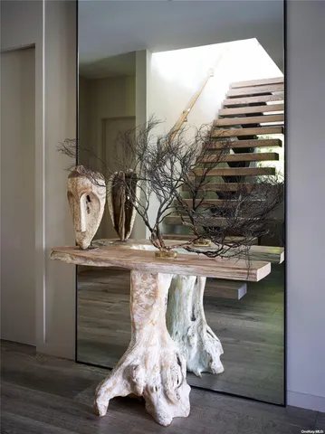 a kitchen with stainless steel appliances granite countertop a sink counter space and dining table