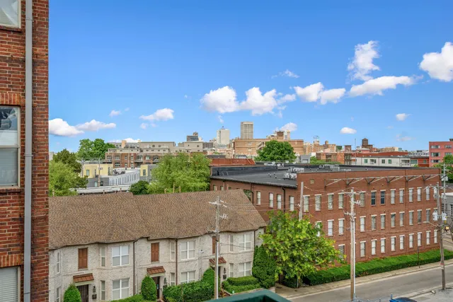 a view of a city with tall buildings