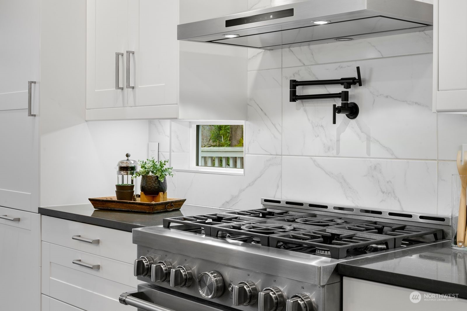 17605 3rd Avenue Southeast Bothell, WA 98012 - Photo 12 of 38 a stove top oven sitting inside of a kitchen