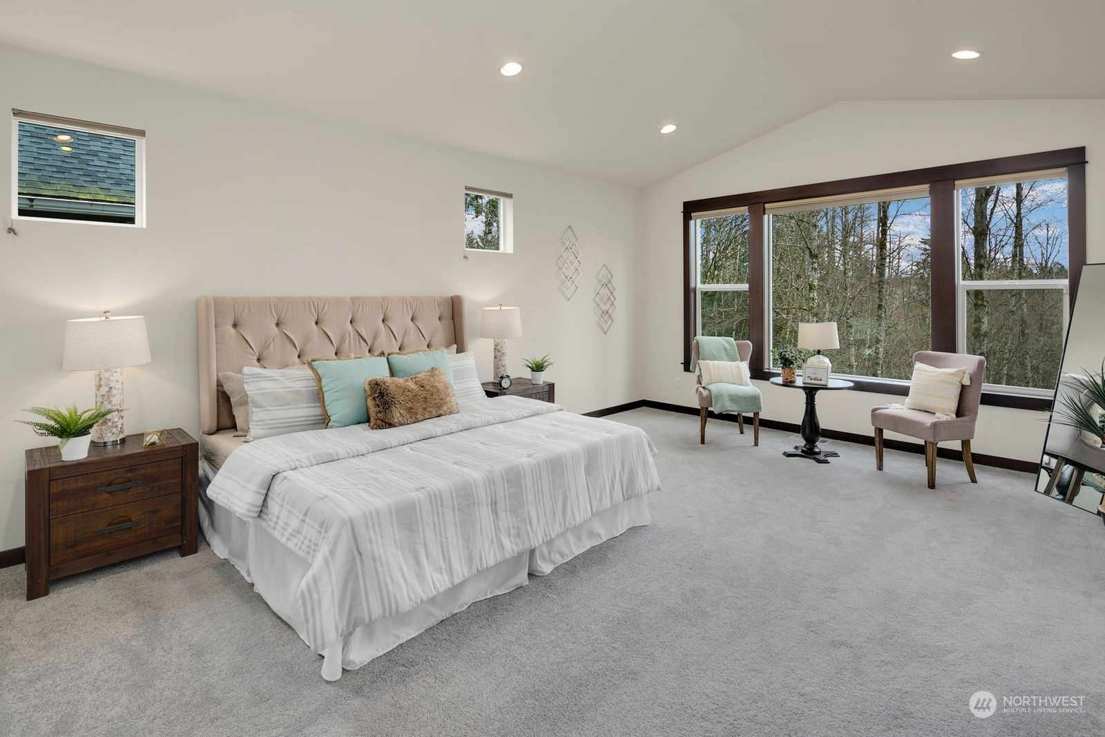 17605 3rd Avenue Southeast Bothell, WA 98012 - Photo 19 of 38 a spacious bedroom with a bed and a large window