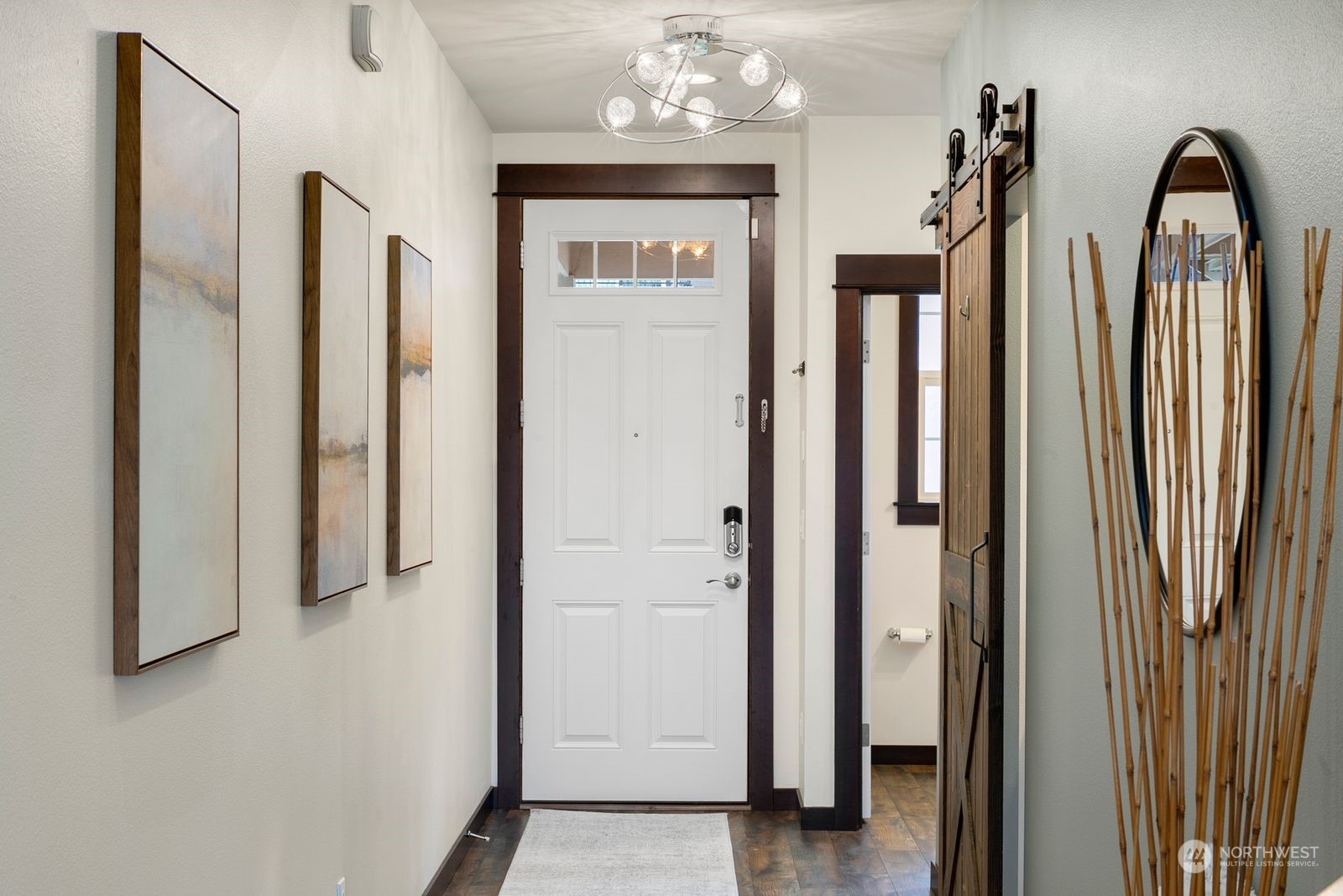 17605 3rd Avenue Southeast Bothell, WA 98012 - Photo 2 of 38 a view of a hallway with windows and stairs