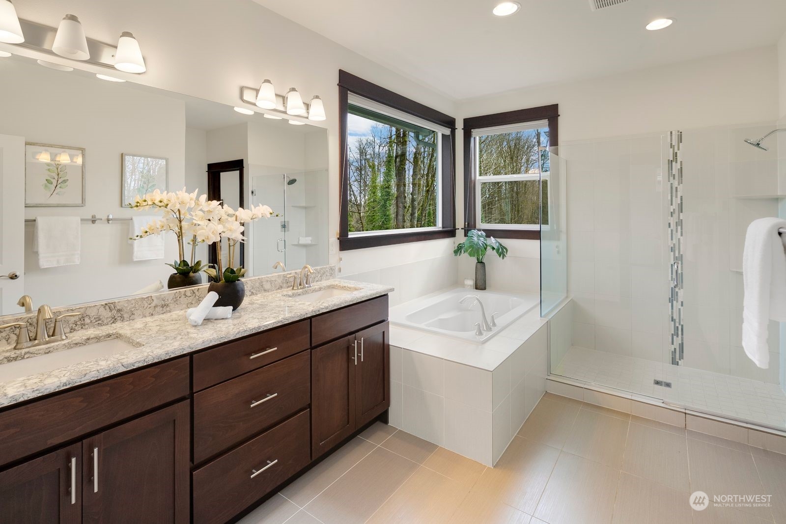 17605 3rd Avenue Southeast Bothell, WA 98012 - Photo 21 of 38 a bathroom with a sink double vanity granite tub shower and mirror