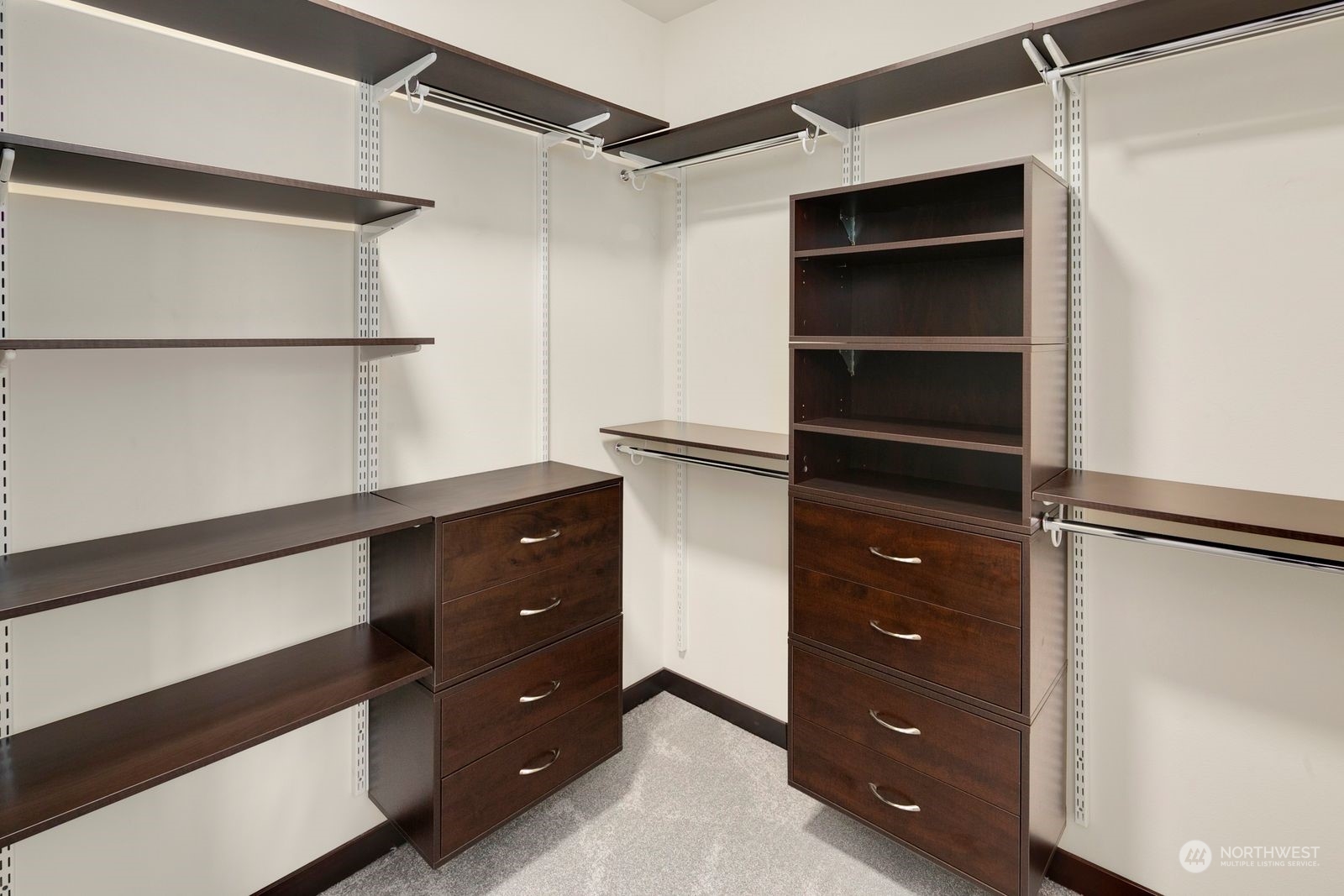 17605 3rd Avenue Southeast Bothell, WA 98012 - Photo 23 of 38 a room with a walk in closet and cabinet