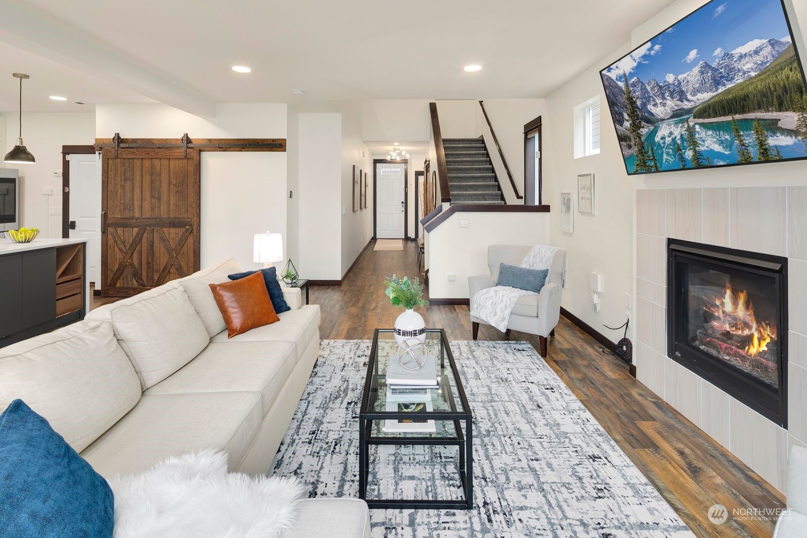 17605 3rd Avenue Southeast Bothell, WA 98012 - Photo 4 of 38 a living room with furniture and a fireplace
