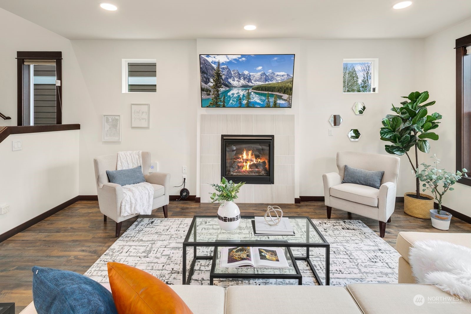 17605 3rd Avenue Southeast Bothell, WA 98012 - Photo 5 of 38 a living room with furniture a rug and a fireplace