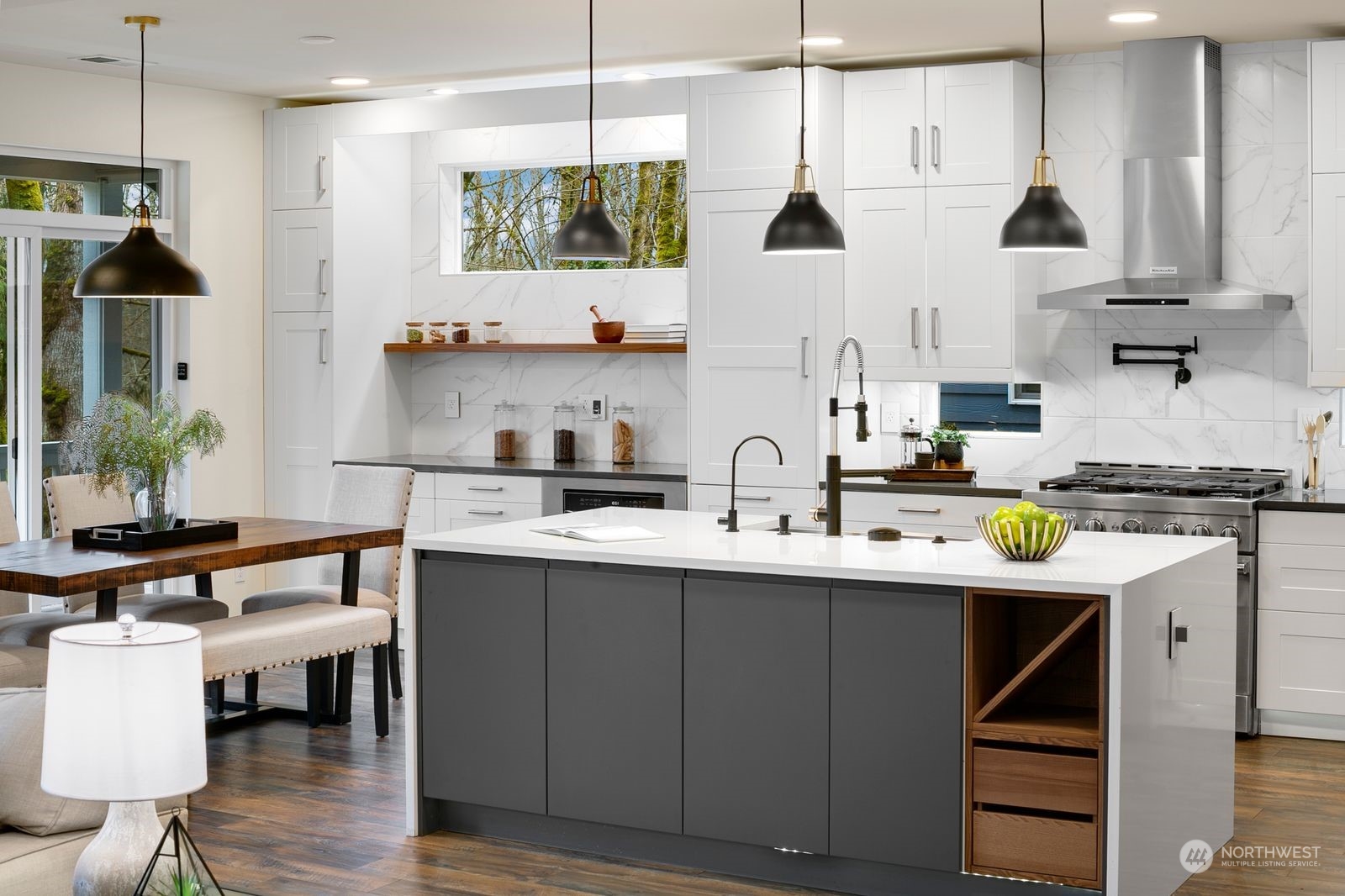 17605 3rd Avenue Southeast Bothell, WA 98012 - Photo 9 of 38 a kitchen with stainless steel appliances granite countertop a sink a stove and cabinets