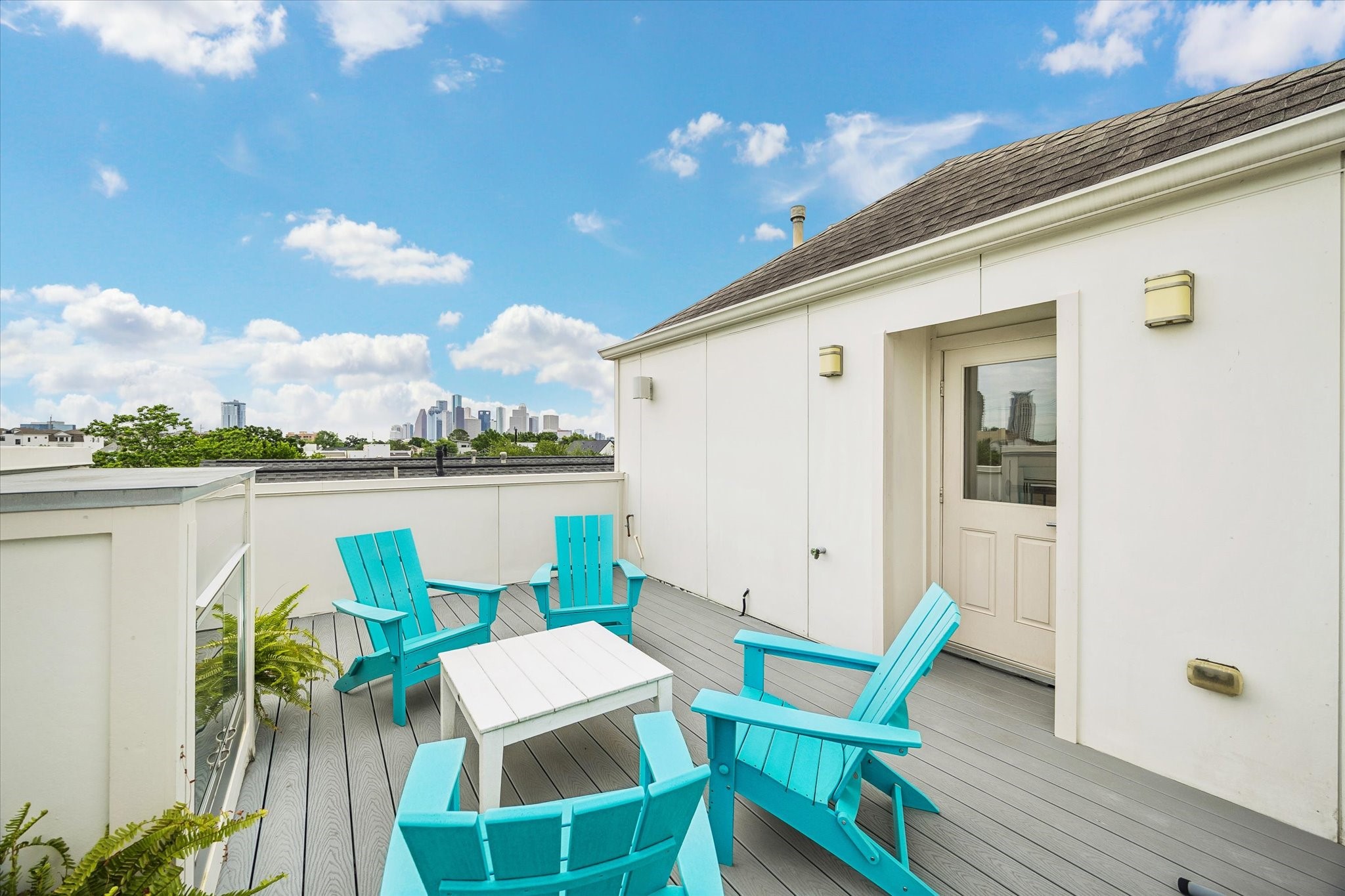 1526 Vermont Street Houston, TX 77006 - Photo 38 of 39 Another view of the rooftop terrace showcasing ample seating space and beautiful Downtown views.