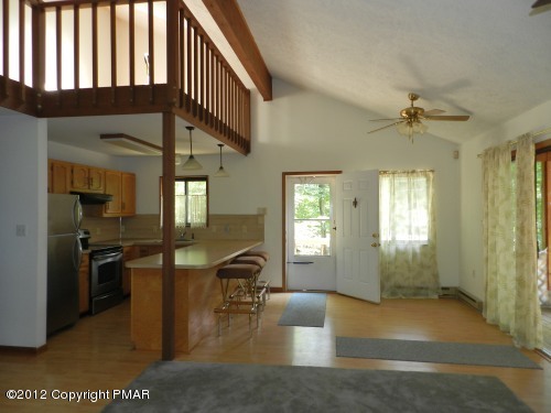 734 Decker Road Bushkill, PA 18324 - Photo 3 of 18 a view of an entryway with a livingroom