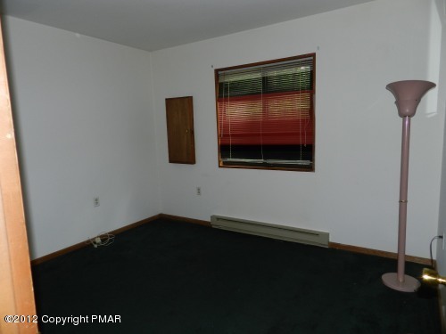 734 Decker Road Bushkill, PA 18324 - Photo 7 of 18 an empty room with a window