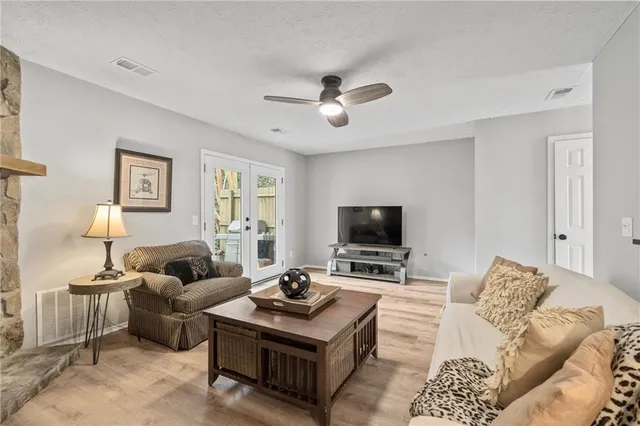 a bathroom with a sink a mirror a toilet and a mirror