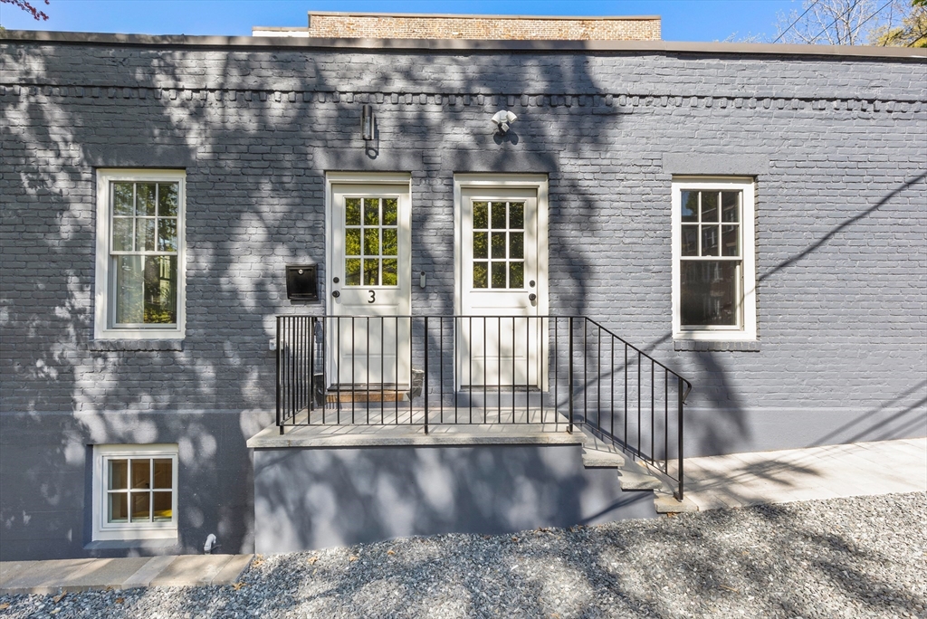 46 Lancaster Terrace, Unit 46 Brookline, MA 02446 - Photo 22 of 25 a view of a brick house with windows