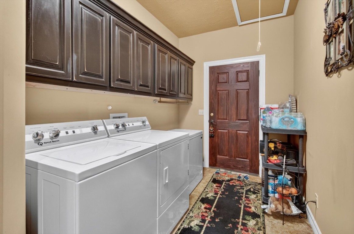 1755 McBride-Devillier Loop Winnie, TX 77665 - Photo 19 of 44 a room with storage and utility