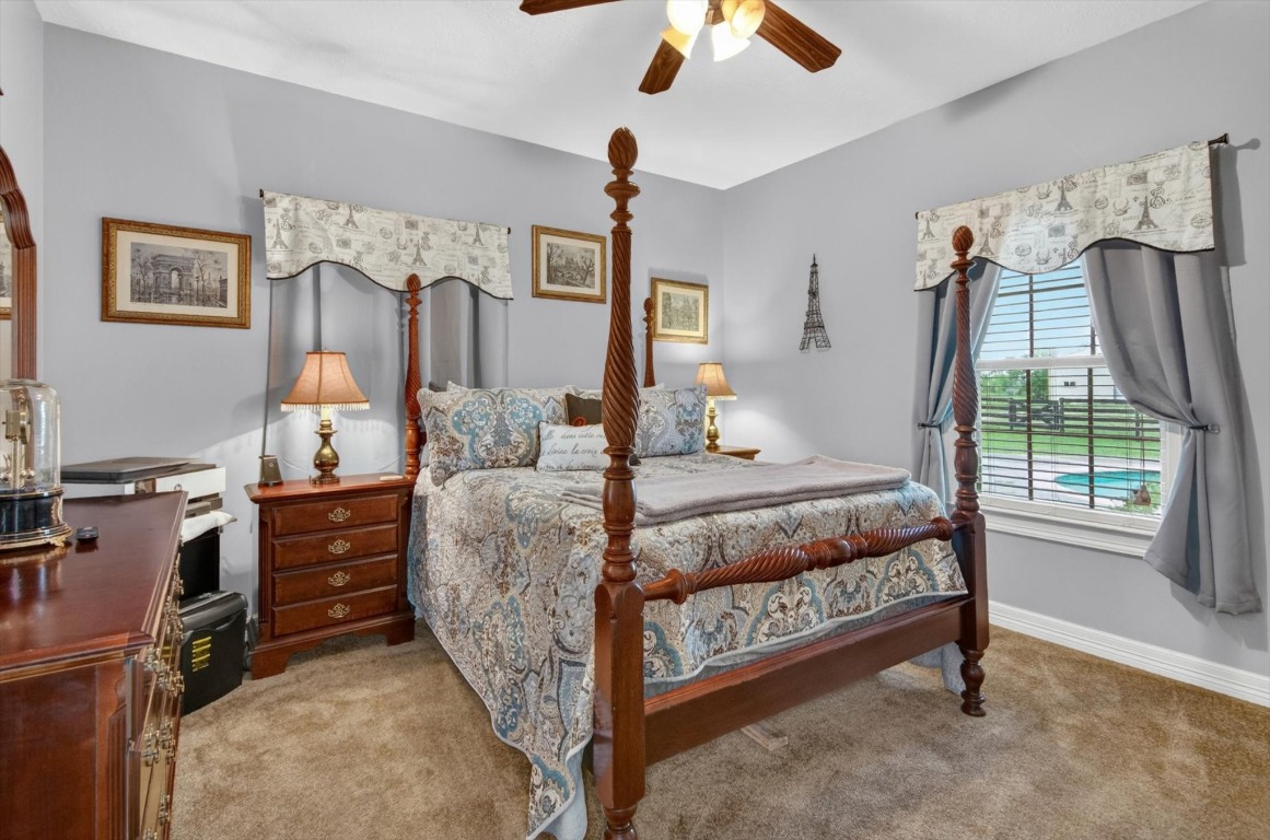 1755 McBride-Devillier Loop Winnie, TX 77665 - Photo 29 of 44 a bed room with a bed and a window