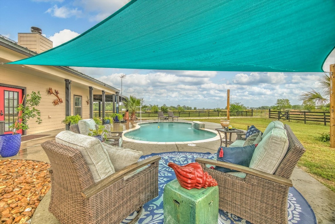 1755 McBride-Devillier Loop Winnie, TX 77665 - Photo 31 of 44 a outdoor space with patio area