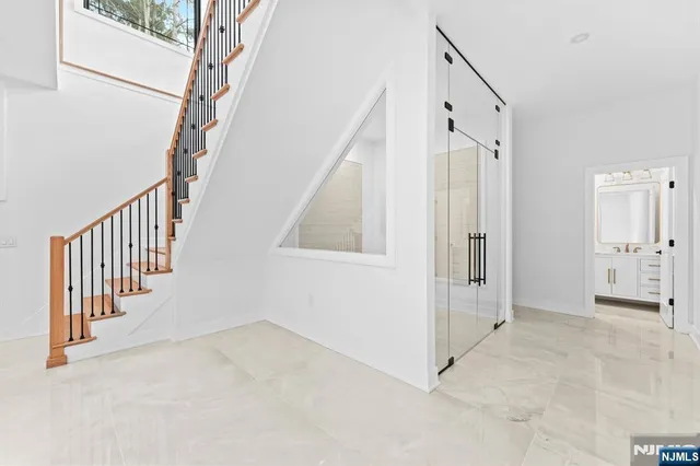 a view of an entryway with staircase