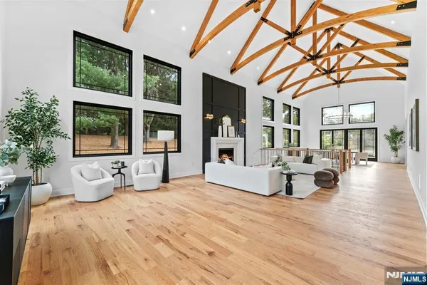 a view of a patio with couches and potted plants
