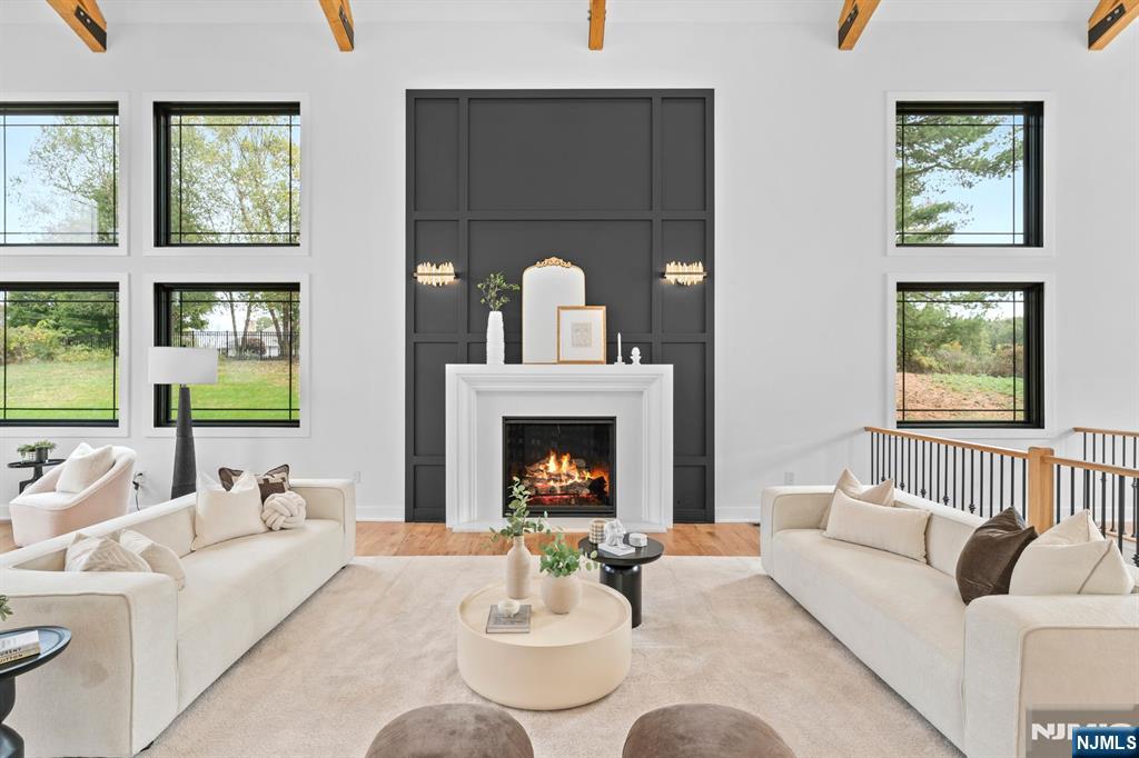465 Cherry Lane Mendham, NJ 07945 - Photo 5 of 38 a living room with furniture fireplace and window