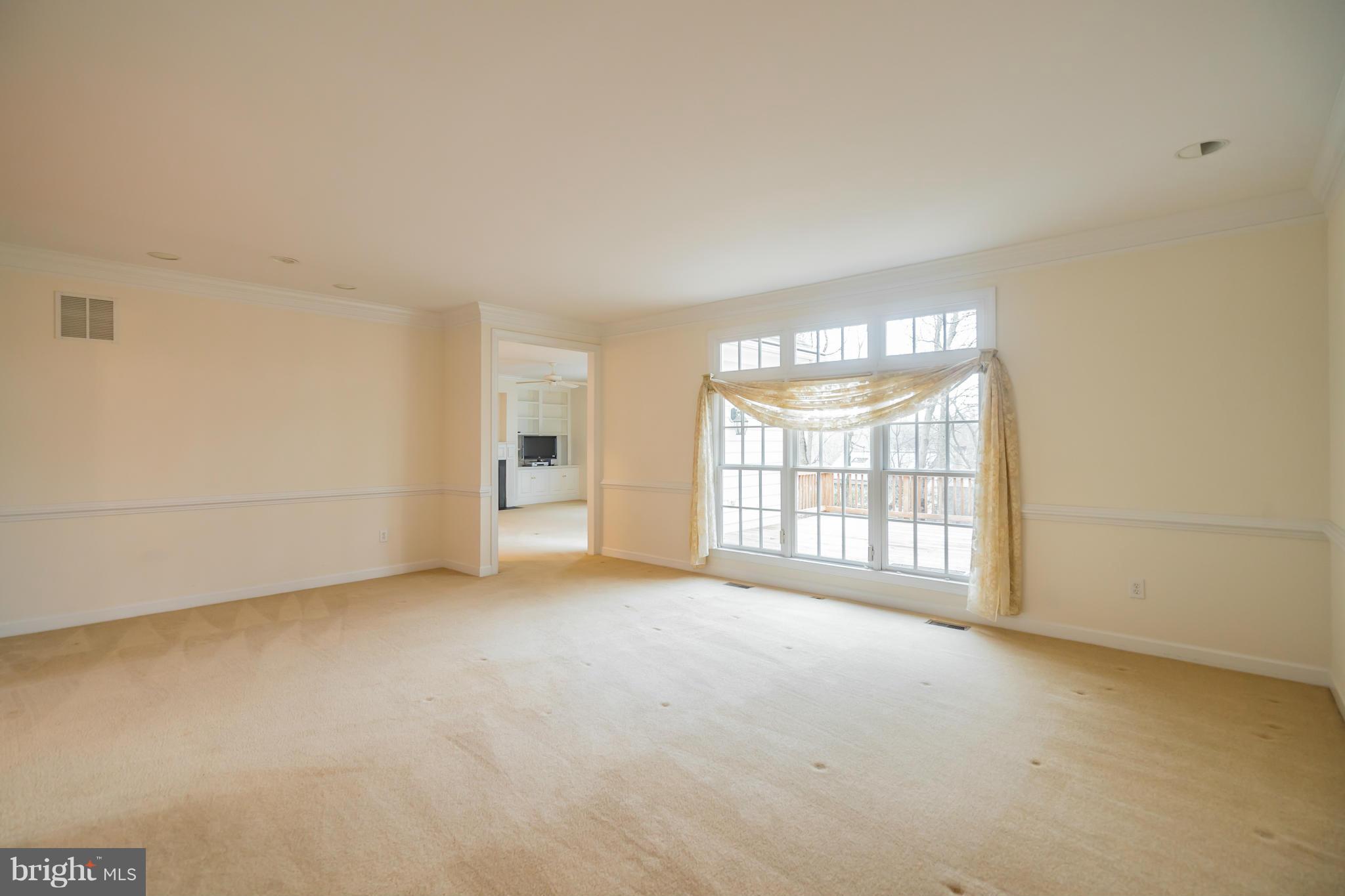 9504 Emory Grove Road Gaithersburg, MD 20877 - Photo 12 of 30 a view of an empty room with a window
