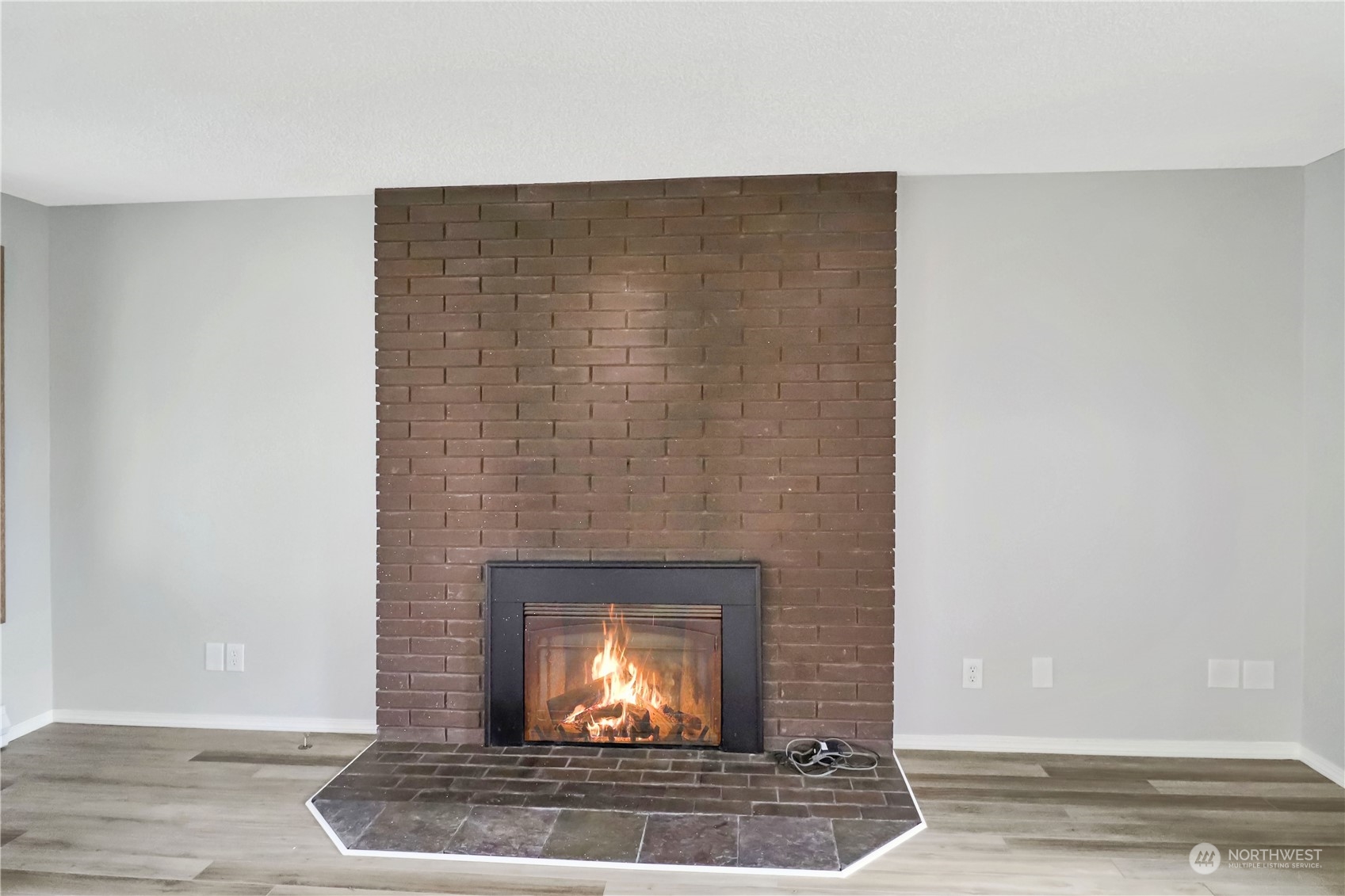 18237 Nutmeg Court Southwest Rochester, WA 98579 - Photo 17 of 34 a living room with a fireplace