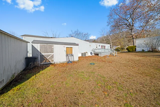 a view of a house with a snow on the road