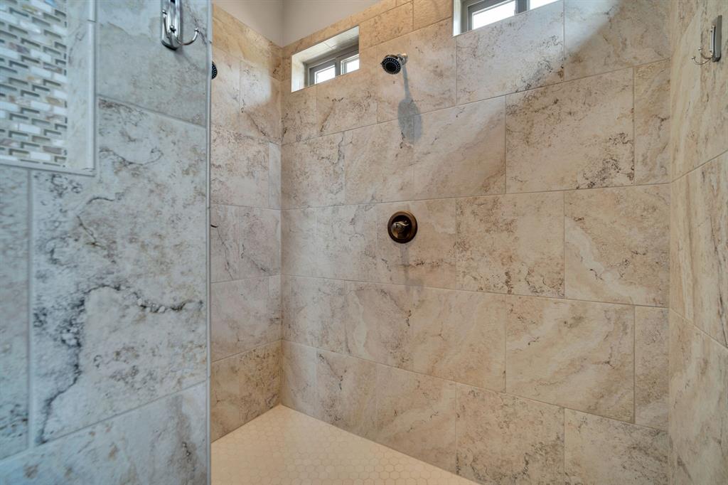 136 Sullivan Way Waxahachie, TX 75167 - Photo 26 of 40 a bathroom with a shower