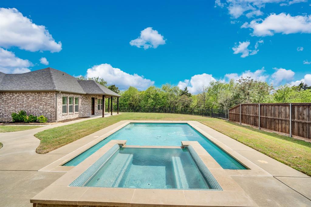 136 Sullivan Way Waxahachie, TX 75167 - Photo 3 of 40 a view of swimming pool with lounge chair