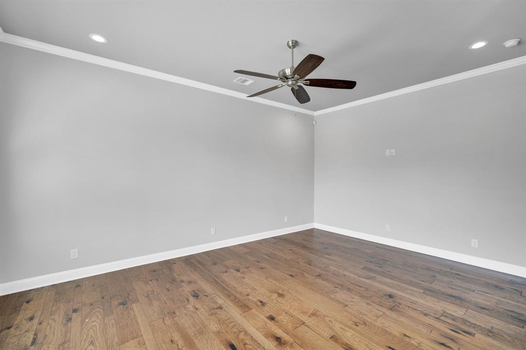 136 Sullivan Way Waxahachie, TX 75167 - Photo 33 of 40 wooden floor in an empty room