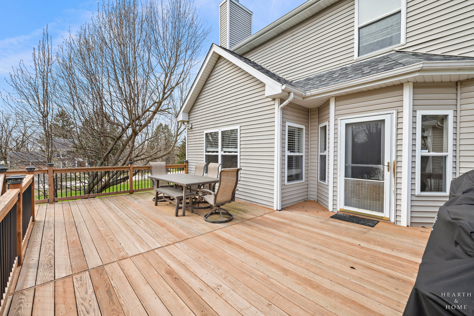 10514 Ridge Lane Marengo, IL 60152 - Photo 44 of 51 a view of a house with a patio and wooden floor
