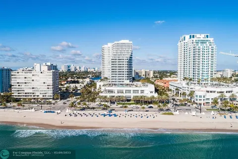 a view of a city with tall buildings