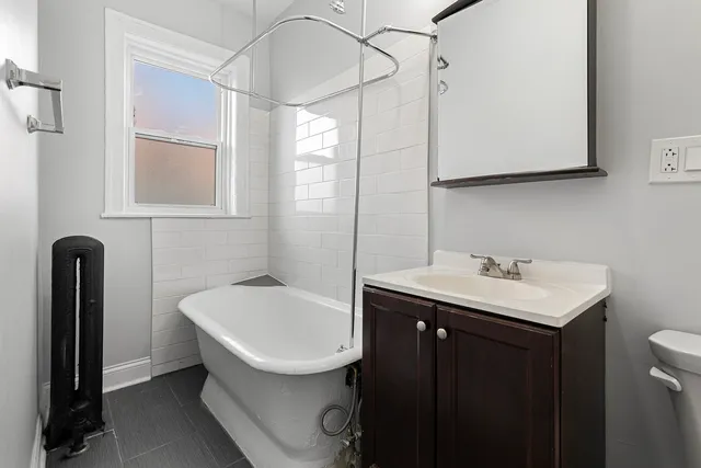 a bathroom with a sink and a bathtub