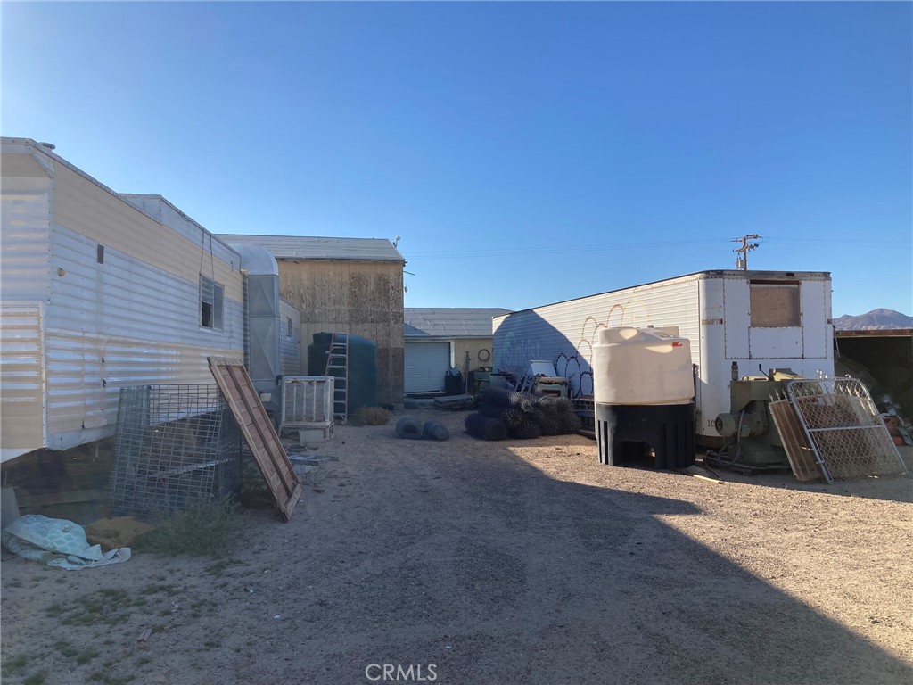 35127 Condor Road Newberry Springs, CA 92365 - Photo 12 of 60 a view of a house with a patio