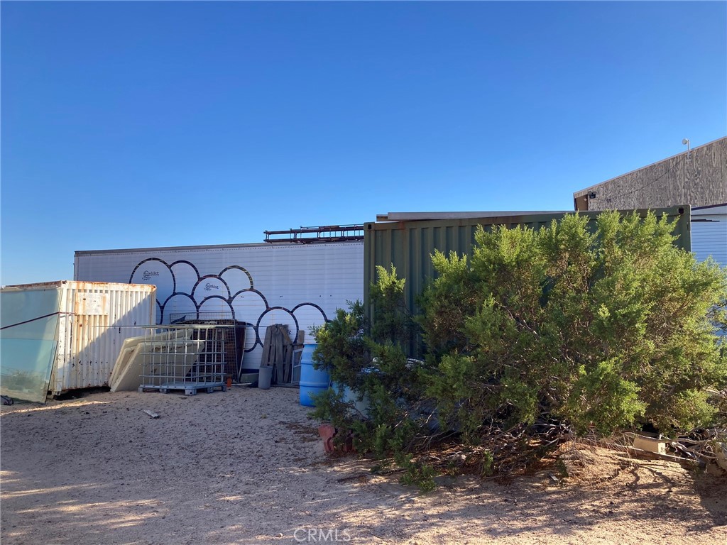 35127 Condor Road Newberry Springs, CA 92365 - Photo 14 of 60 a view of a street with a building in the background