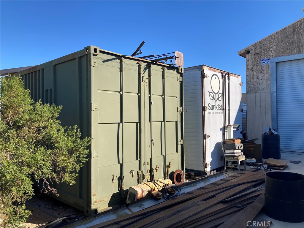 35127 Condor Road Newberry Springs, CA 92365 - Photo 15 of 60 the 14' green storage container does not stay. The white (Sunkist) 45' container stays.