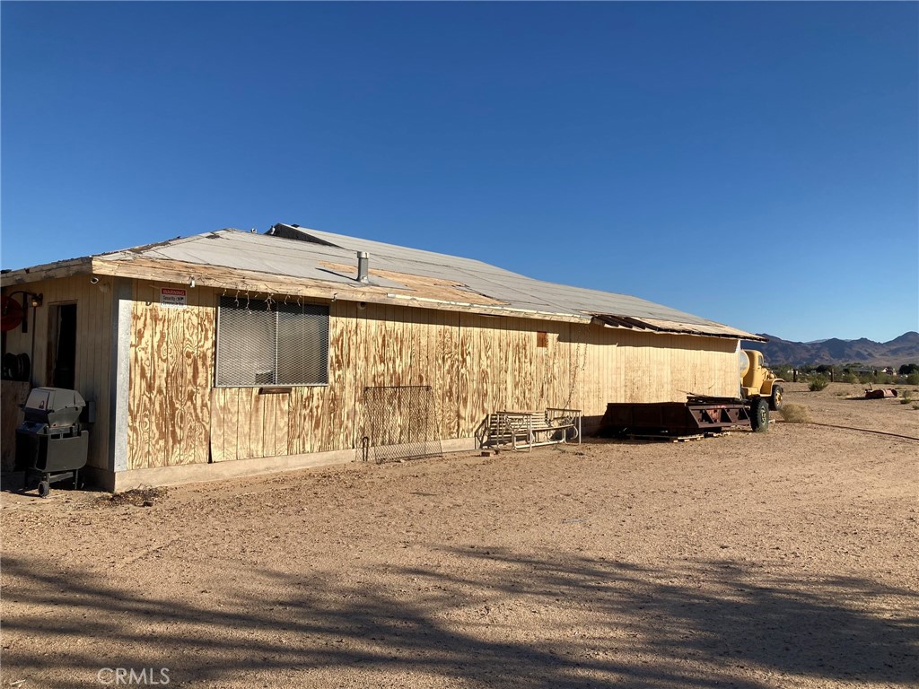 35127 Condor Road Newberry Springs, CA 92365 - Photo 2 of 60 a view of a house with a yard