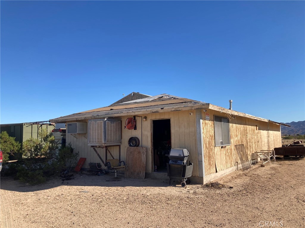 35127 Condor Road Newberry Springs, CA 92365 - Photo 3 of 60 a view of a house with backyard