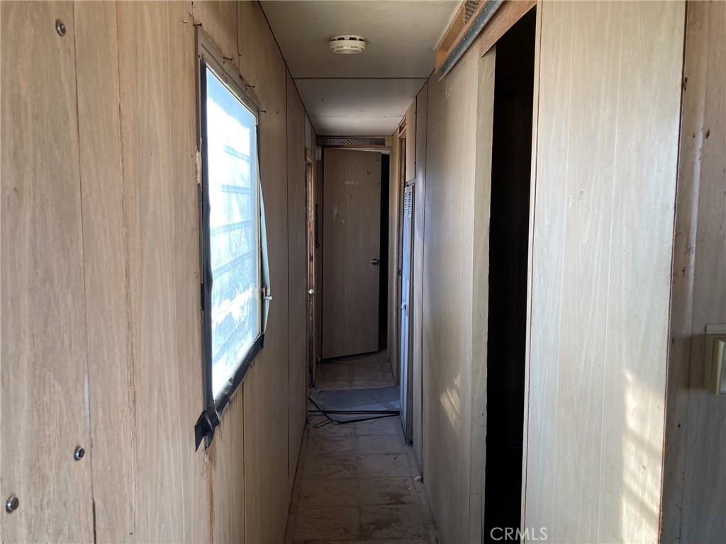 35127 Condor Road Newberry Springs, CA 92365 - Photo 47 of 60 Mobile home hall, heading towards bedroom and bathroom