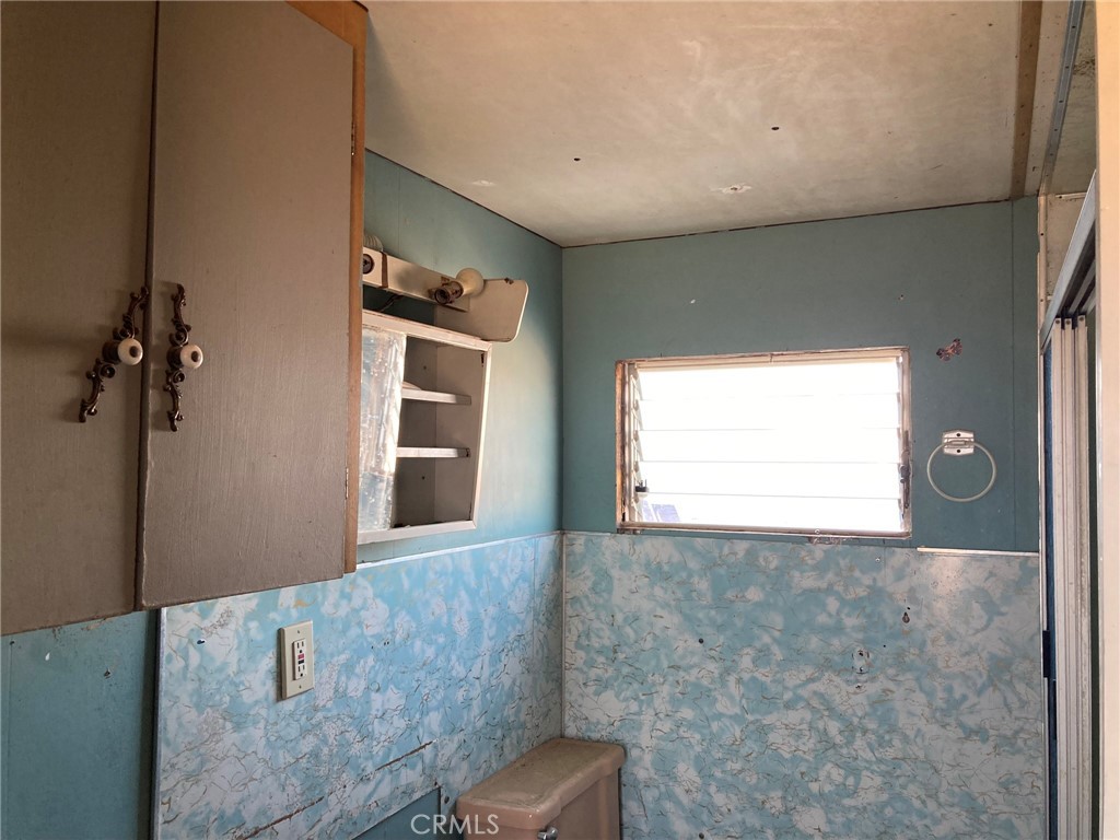 35127 Condor Road Newberry Springs, CA 92365 - Photo 52 of 60 a view of an empty room with a window
