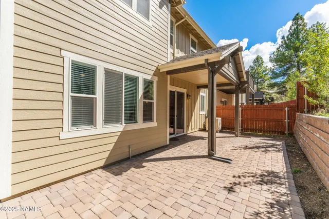 a house with trees in front of it