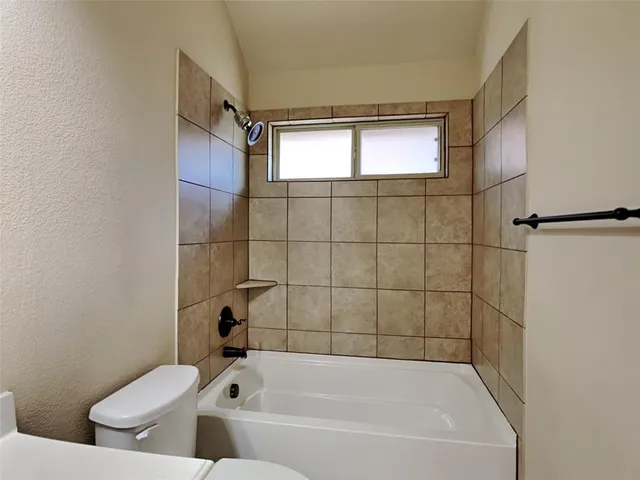 a bathroom with a sink and a tub