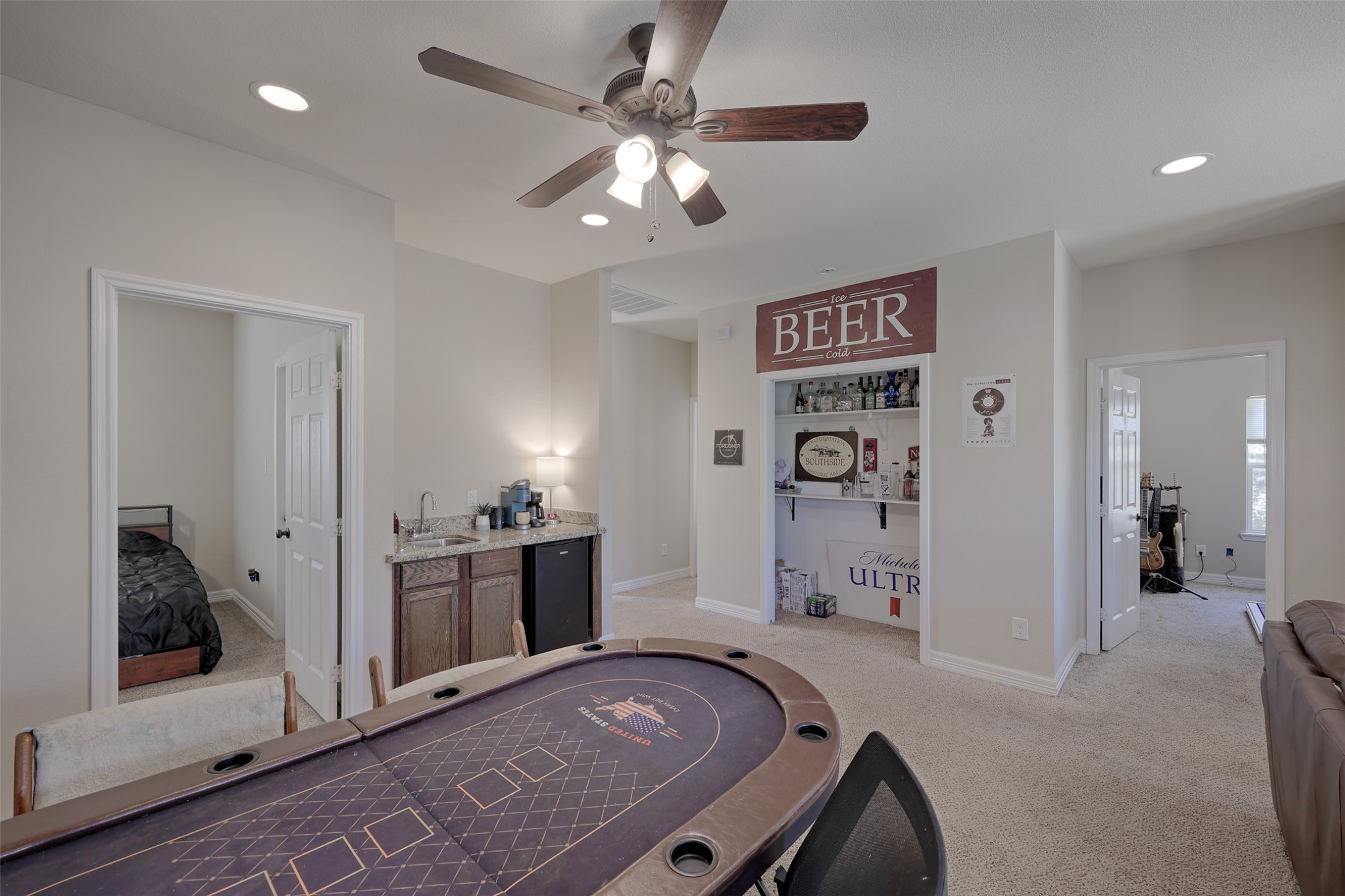 1122 Detroit Street College Station, TX 77840 - Photo 23 of 48 Upstairs gameroom features wet bar and minifridge.